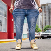 Jean extensible déchiré à la cheville pour hommes de grande taille